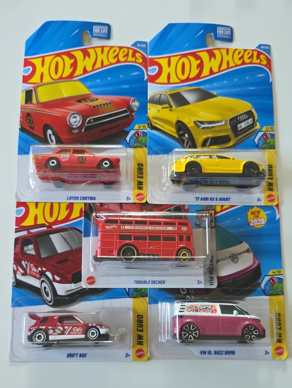 Hot Wheels Euro Cars - Assorted Red & Yellow Vehicles And Double Decker Bus